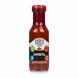 Bottle of Seres Foods Sambal Hot Sauce with red chili pieces in glass bottle