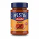 Jar of Barilla Pesto Rosso sauce with blue lid and orange label
