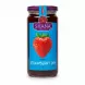 Glass jar of Shana brand strawberry jam with blue label and large strawberry image