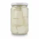 Close-up of Akkawi cheese cubes in brine inside glass jar