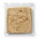 Close-up of a single brown-speckled Lebanese Lavash Markouk wrap in plastic packaging