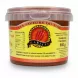 Container of Bled Harissa hot pepper paste with red chili graphic on label