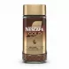 Glass jar of Nescafé Gold Blend instant coffee with gold and brown label