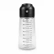 Syrup dispenser bottle showing measurement markings on clear container
