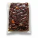 Close-up view of vacuum-sealed Saudi dates showing moist texture