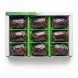 Seven individually wrapped Ajwa dates inside the box