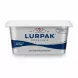 Lurpak Spreadable tub held in hand with label showing brand and product type