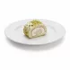 Single slice of pistachio cream roll on white plate, showing creamy filling