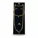 Matching gold-tone necklace, bracelet and ring set shown on black velvet display card