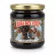 Glass jar of Basra Date Syrup with gold lid and label showing a date palm tree