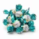 Close-up of individual LaLe Olivya chocolates wrapped in colourful foil