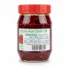 Jar of bright red extra hot chilli oil with red lid and label