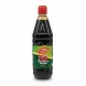 Bottle of Teeba Pomegranate Molasses showing front label with red cap