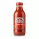 Dawtona brand glass bottle of tomato juice front label