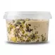 Enhanced Side view of Safa Halawa Pistachios showing nut-packed contents inside clear tub