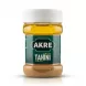 Enhanced Front view of Akre Tahini 350g jar with white lid and green label