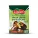 A professional studio photograph of the Alsaadah Dry Eggplant retail box, centered against a clean white background. The box, which is in sharp focus, displays the complete green and white packaging design with the red and white Alsaadah logo in English and Arabic. Text reads: "Since 1990," "GETROCKNETE AUBERGINEN," "بَاذِنْجَانٌ مُجَفَّفٌ," "DRY EGGPLANT," and "Quality %100." A realistic image of stuffed and cooked aubergine pieces is prominent, along with a 'PIECES 25' label. A soft, symmetric shadow is cast beneath the product. PROD-URL: www.example.com/dry-eggplant-pack-alsaadah-25