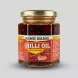 Enhanced Bang Bang Chilli Oil With Shrimps jar held in hand in grocery aisle