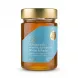 Enhanced Minos Greek honey jar with blue label front view