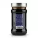 A clear glass jar of Bodrum Mulberry Molasses Natural, 380g, centered on a white background with soft symmetrical shadows. The dark purple label clearly displays the text 'MULBERRY - DUT', specific product claims like '100% from mulberries', and 'No added sugar', a product description, website URL, net weight, and a barcode. The glass and silver lid are clean and reflect professional studio lighting.