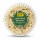 Top view of Aytac Pistachio Halva in clear resealable container showing pistachio pieces
