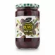 Jar of Greenfields Kalamata Olives showing label and olives inside