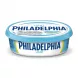 A 165g oval tub of Philadelphia Light Soft Cheese Spread, with white and blue packaging and a matching lid, presented centrally against a plain white studio background.