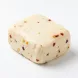 Enhanced Unpacked Dairy Day Halloumi with visible chilli flakes