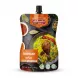 A 6 oz pouch of Adonis Spices Quick Biryani Marinade, featuring a visual of yellow rice, roasted chicken, and spices, with text in both English and Arabic. The packaging highlights "Mediterranean Flavor" and includes certifications for "Quality" and "GMO free," with a "Mild" spice level indicator.