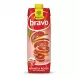 Enhanced Front view of Rauch Bravo Red Orange Juice carton held in hand, with vibrant red and sliced blood oranges on the packaging.