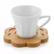 Enhanced Single white porcelain cup on bamboo flower coaster displayed on countertop