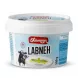 Enhanced Tasmeen Labneh 500g tub held in hand in front of supermarket dairy shelf