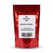 Back of Madina Halal Mixed Sweets 200g pouch showing product details, weight, barcode, and distributor information.