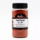 Hand holding a jar labelled Moroccan Spices Sweet Paprika 150g with a clear black lid
