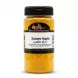 Front view of Moroccan Spices Turmeric Powder jar held in hand