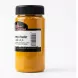 A clear glass jar filled with vibrant yellow Moroccan Spices Turmeric Powder. The jar features a label with a barcode and Arabic text, and is shown against a clean, solid white background with professional lighting.