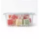 Side view of plastic container showing layers of multi-coloured Turkish Delight cubes