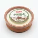 Hand holding Melis Buffalo Yoghurt 400g container in a shop aisle