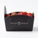 Side view of Beekers Berries strawberry carton displaying the brand logo.